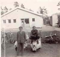 Vespa 125 cc 1953 with me sitting on and brother Sven-Erik standing beside